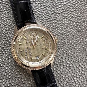 DKNY Gold Dial with Black Strap women’s Watch